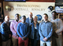 football captains, coach, school superintendent, and mayor